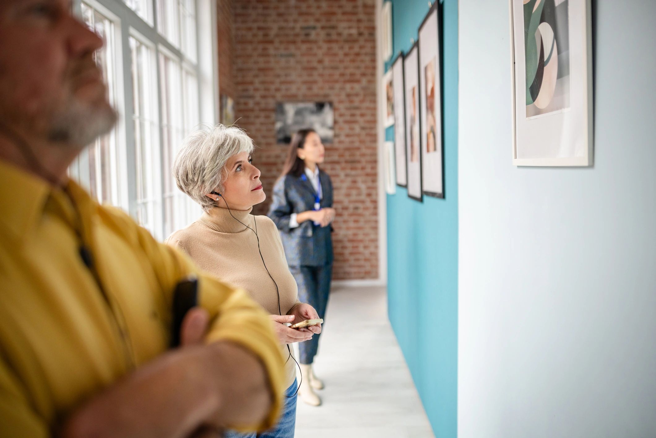 art collectors viewing artwork